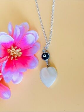 Carved shell heart pendant necklace